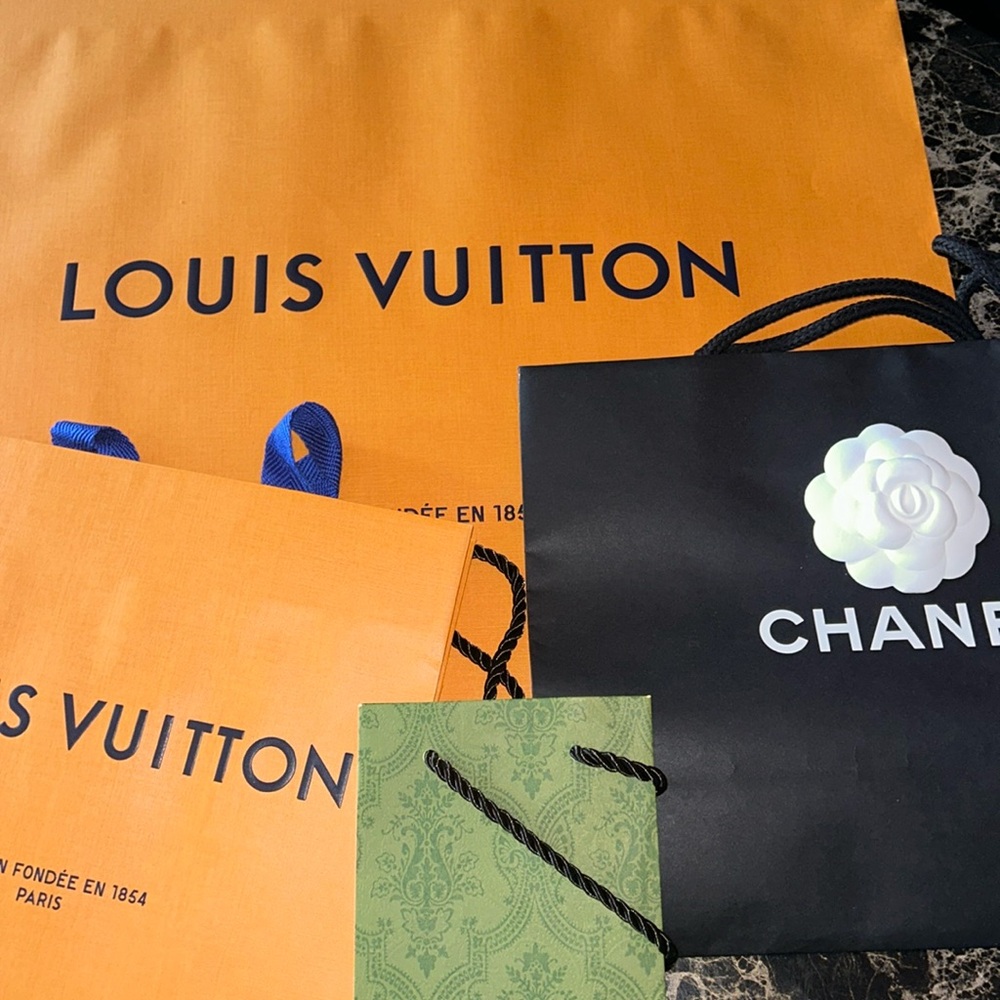 Louis Vuitton, Chanel Gucci shopping bags